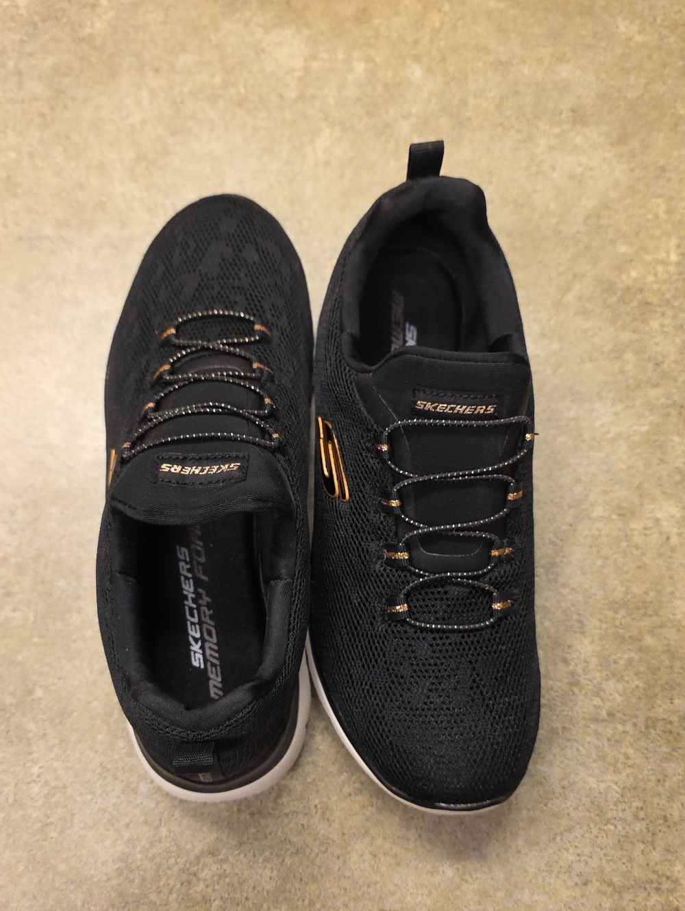 Skechers Women’s Black Slip-On Knit Sneakers with Gold Accents, Size 7